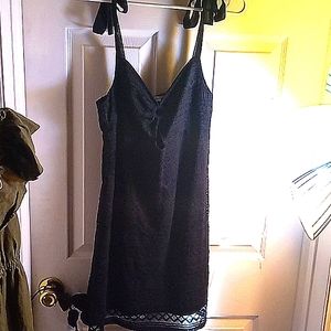 Live to be spoiled size L sleeveless black knee high dress